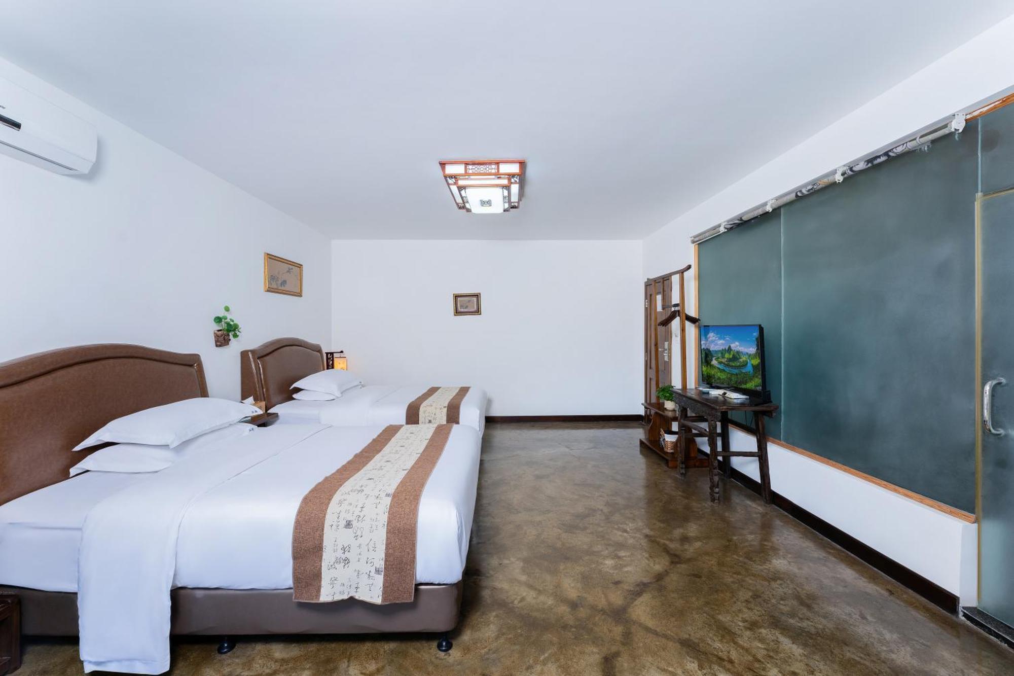 Leisure Courtyard Hotel Yangshuo-Free Shuttle Bus To Yangshuo Station Stay 2 Nights One Way المظهر الخارجي الصورة